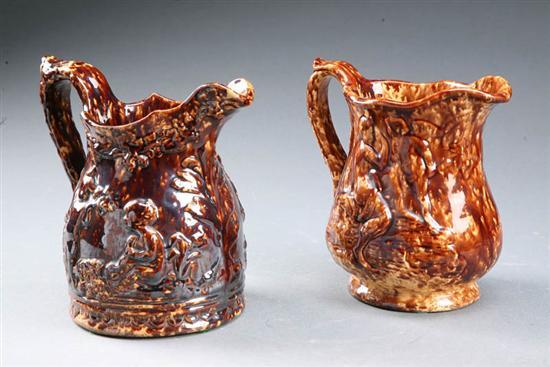 Appraisal: TWO ROCKINGHAM PITCHERS American mid th century ceramic One with