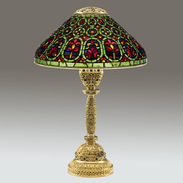 Appraisal: TIFFANY STUDIOS Jeweled Venetian gilt-bronze table lamp with a four-socket