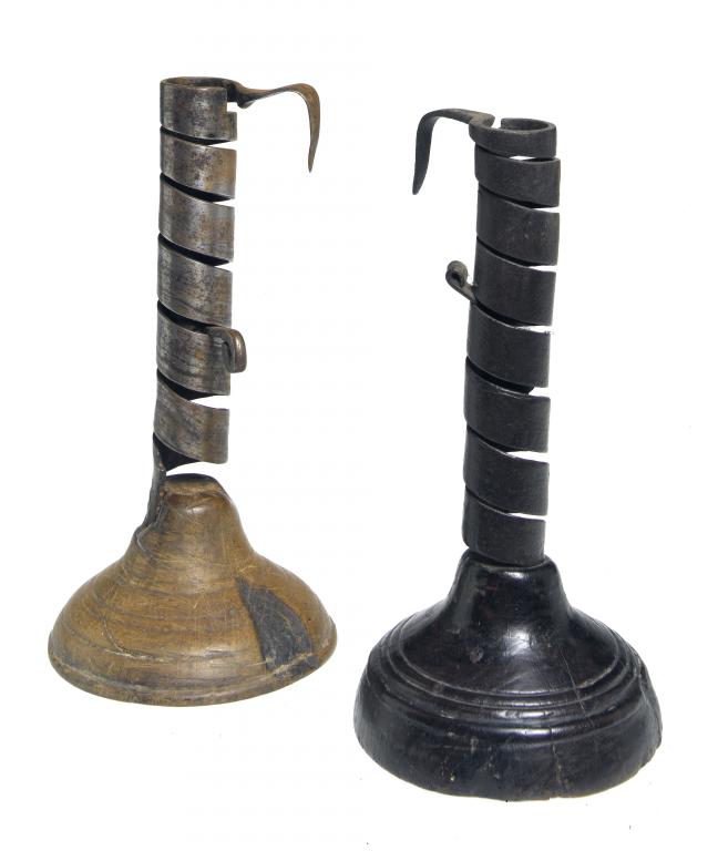 Appraisal: TWO ENGLISH CANDLE-HOLDERS similarly formed from a flat strip of