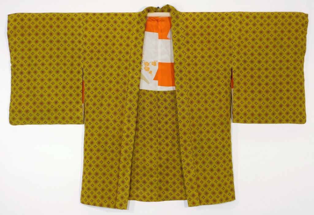 Appraisal: JAPANESE YELLOW FLOWERS HAORI JACKET Japan - th CenturyWoven yellow