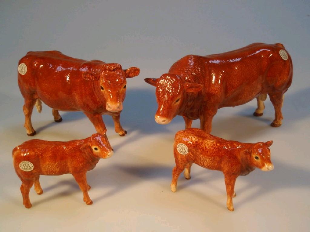 Appraisal: A Border Fine Arts Pottery Company family of Limousin cattle