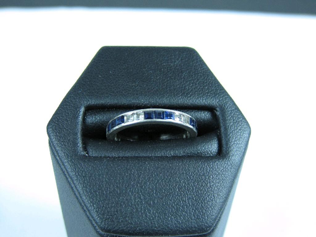 Appraisal: A Sapphire Eternity Ring channel-set blue and white calibre-cut stones