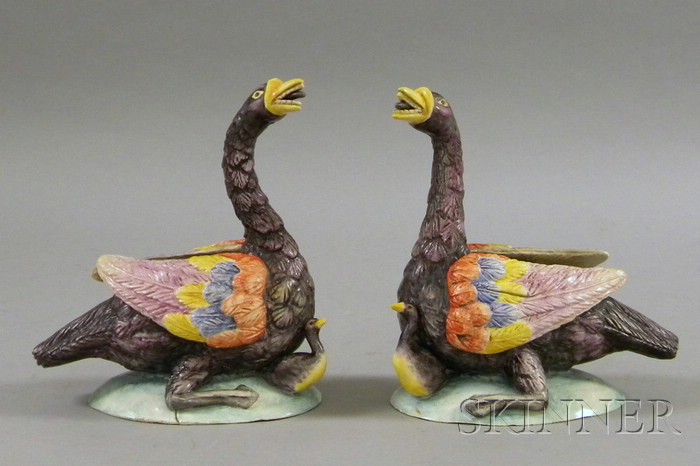 Appraisal: Pair of Polychrome Decorated Ceramic Swan Figural Groups th century