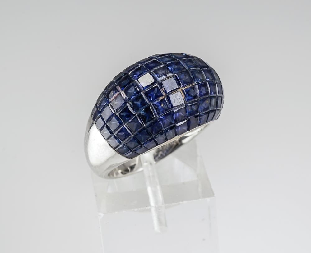 Appraisal: -KARAT WHITE-GOLD AND BLUE SAPPHIRE RING -Karat White-Gold and Blue