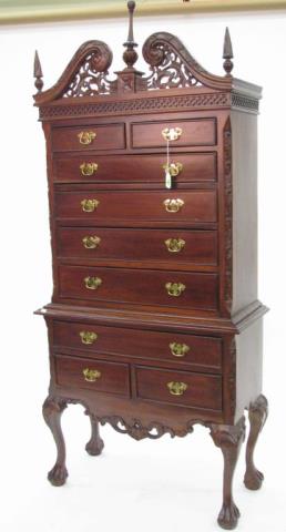 Appraisal: A reproduction Chippendale highboy small scale design with carved base