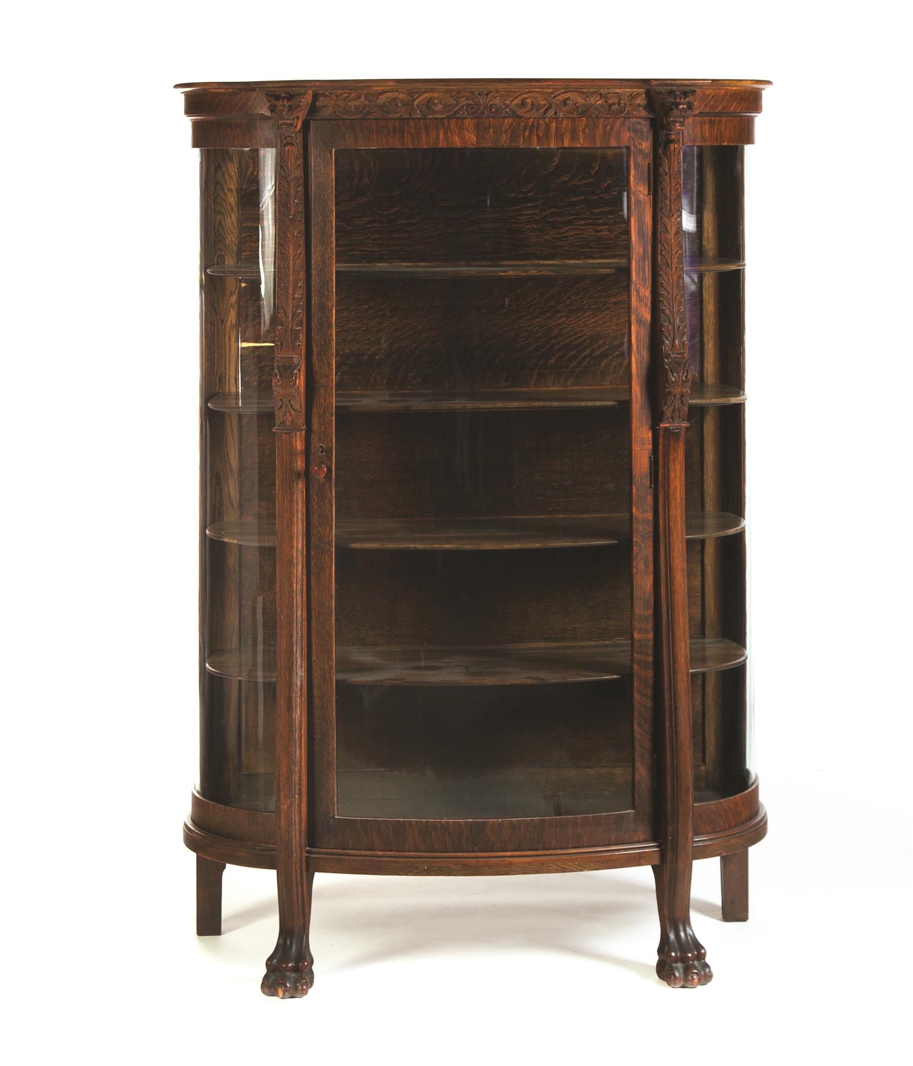 Appraisal: CURVED GLASS OAK CHINA CABINET American st quarter- th century