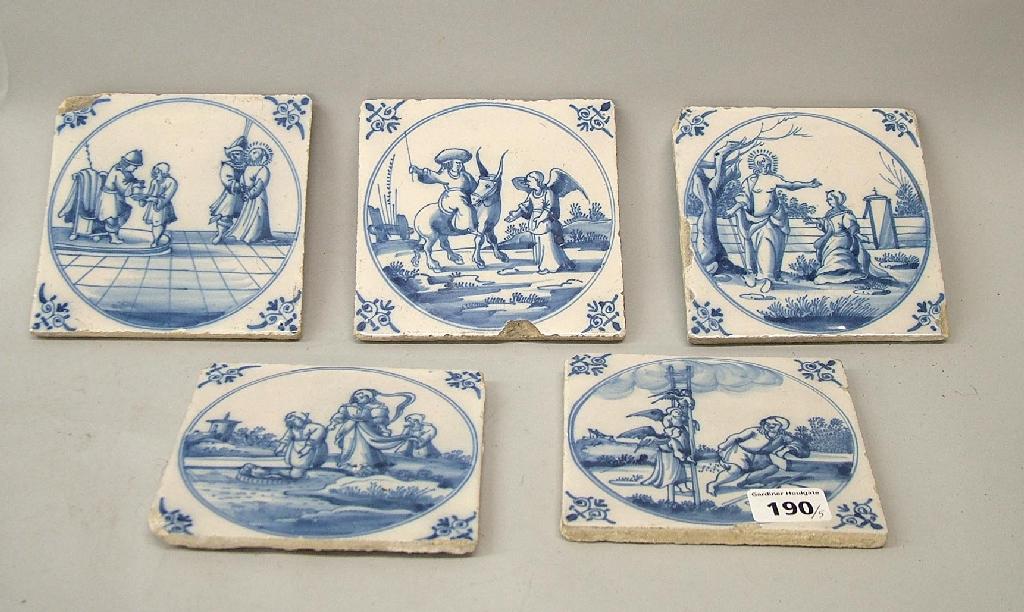 Appraisal: Set of five blue and white square pottery tiles decorated