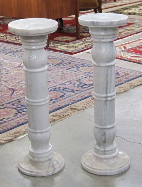 Appraisal: PAIR OF ITALIAN CARRARA MARBLE PEDESTALS of round columnar form