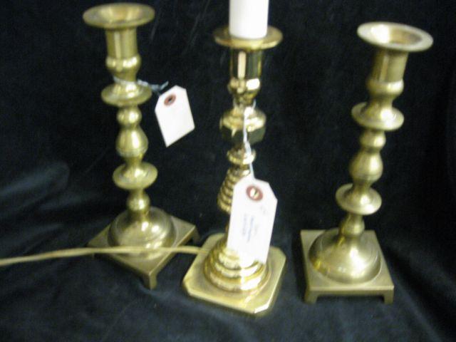 Appraisal: Pair of Brass Candlesticks and a candlestick lamp sticks are