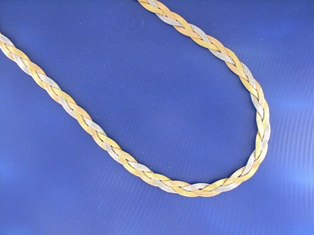 Appraisal: An Italian ct tri-colour gold flat woven necklace length cm