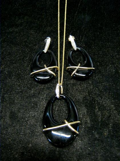 Appraisal: Onyx and diamond necklace and matching earringsHoop shaped onyx acccented