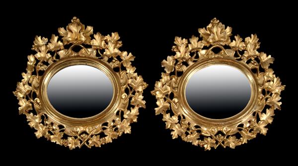 Appraisal: A pair of Florentine giltwood mirrors late th century the