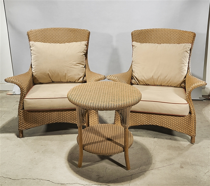 Appraisal: Lloyd Loom outdoor wicker patio set including two arm chairs