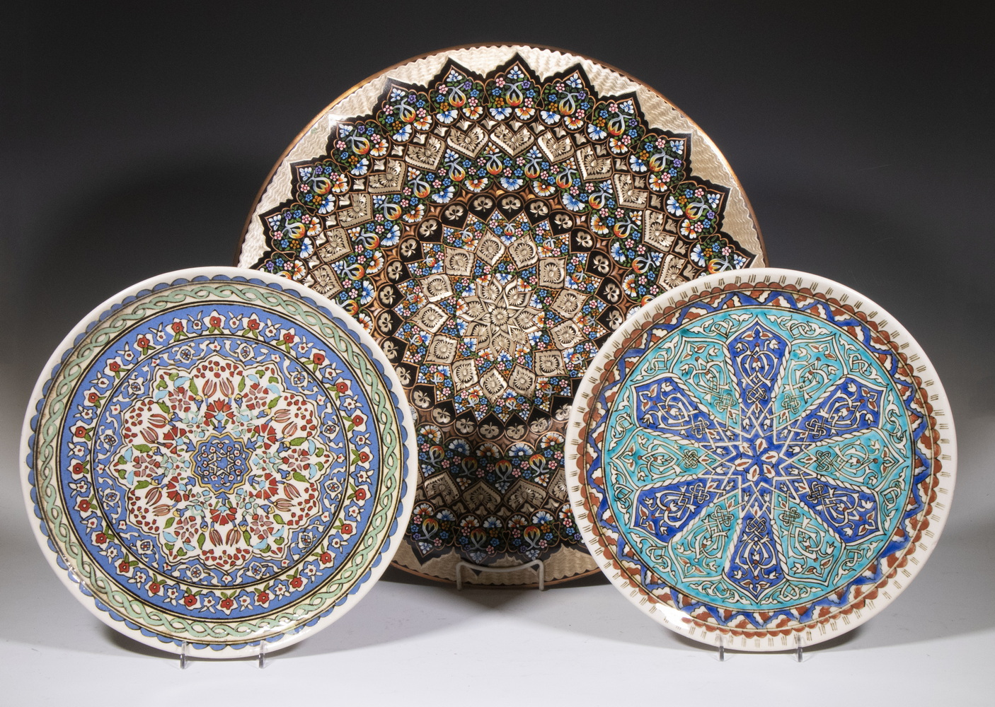 Appraisal: TURKISH DECORATIVE WALL PLAQUES Including Hand painted plates with dark