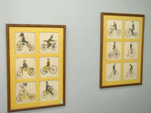 Appraisal: Pair of Framed Prints Depicting Antique Bicycles '' high x