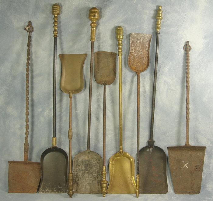 Appraisal: brass wrought iron fire shovels Estimate -