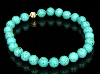 Appraisal: Turquoise Bead Necklace with an Attractive Clasp A strand of