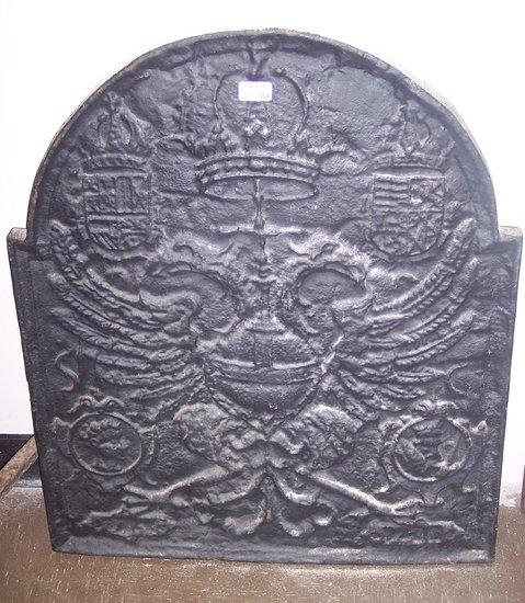 Appraisal: A cast iron arch top fireback with crowned double-headed eagle