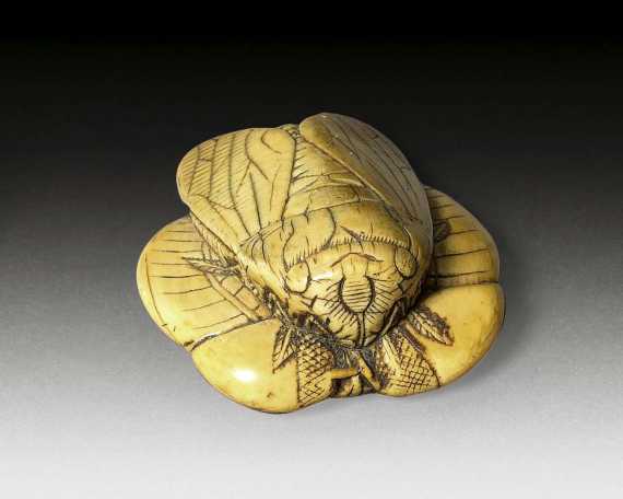 Appraisal: IVORY NETSUKE OF A CIADAD Japan early th century L