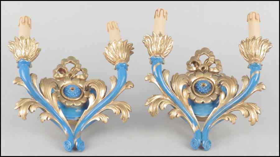 Appraisal: PAIR OF ITALIAN PAINTED AND GILTWOOD TWO-LIGHT SCONCES Electrified ''