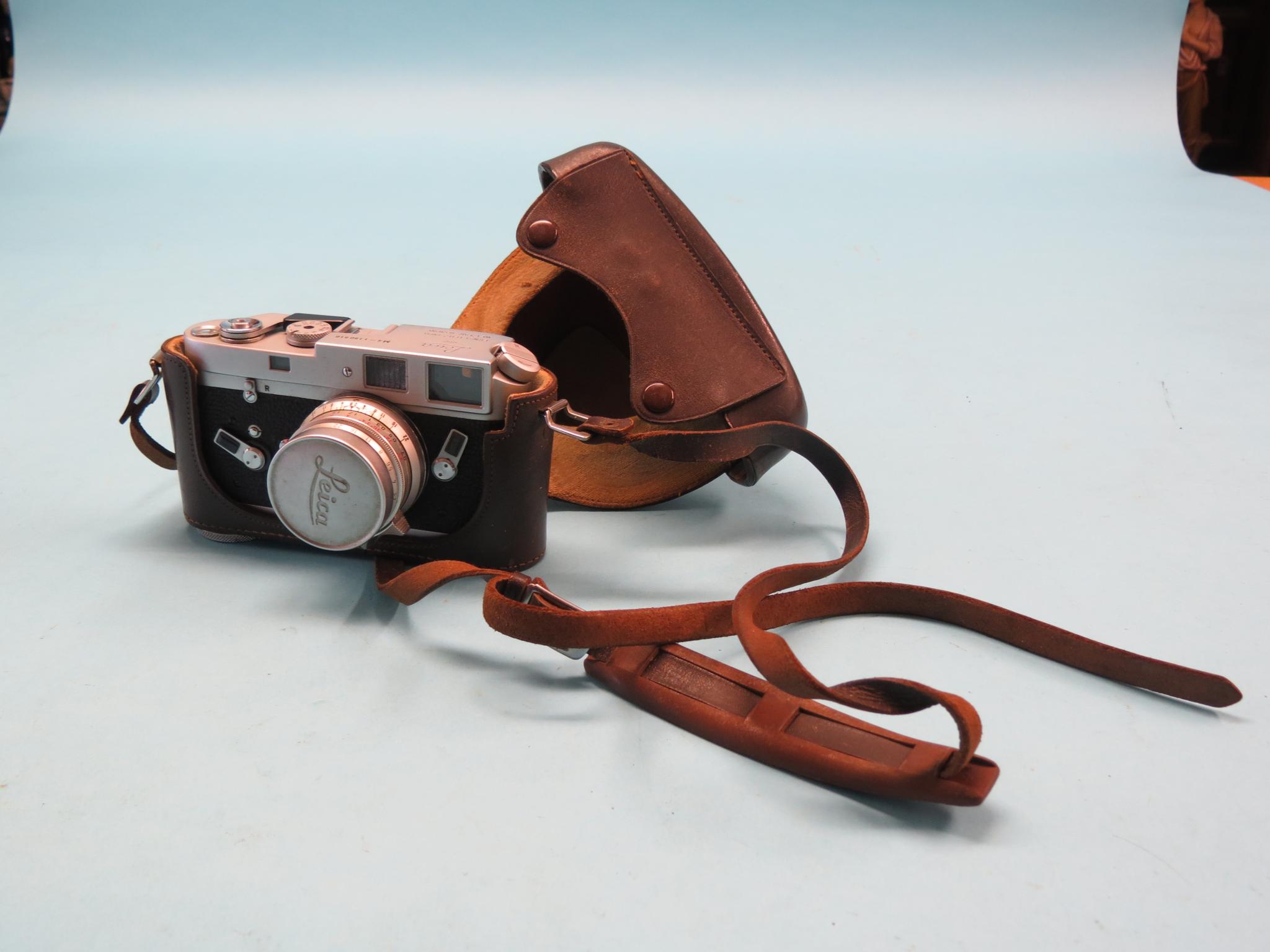 Appraisal: A Leica camera M - Summaron lens in leather case