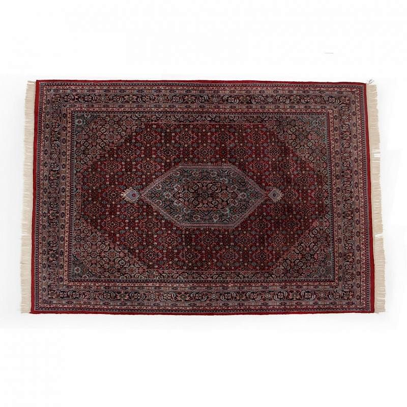 Appraisal: Indo-Bidjar Carpet circa cotton foundation with blue medallion on red