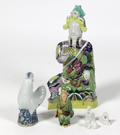 Appraisal: A Ming style pottery figure of a sage seated holding