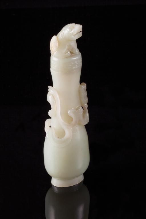 Appraisal: A CHINESE WHITE JADE VASE with a dragon climbing around