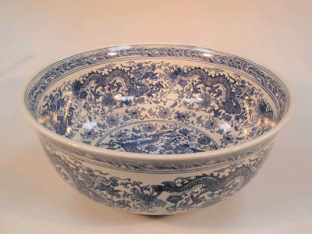 Appraisal: A thC Chinese punch bowl with blue and white decoration