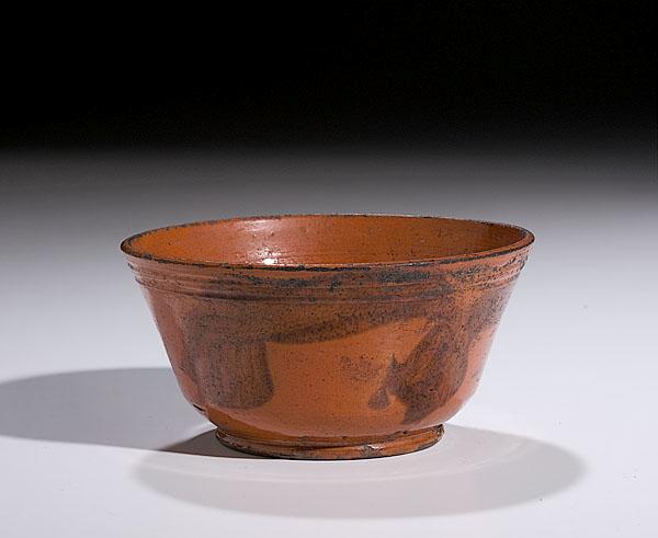 Appraisal: PENNSYLVANIA REDWARE BOWL WITH MANGANESE DECORATION probably C Miller Western