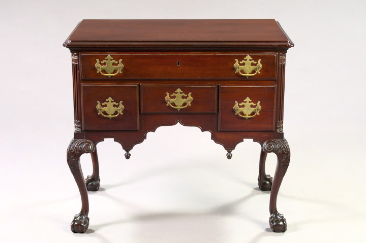 Appraisal: Chippendale-Style Mahogany Lowboy early th century the molded top over