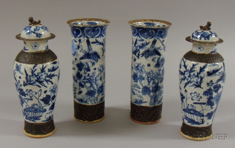 Appraisal: Asian Four-Piece Blue and White Garniture Set two vases and