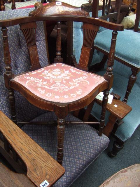 Appraisal: A pair of Edwardian mahogany and marquetry corner chairs with