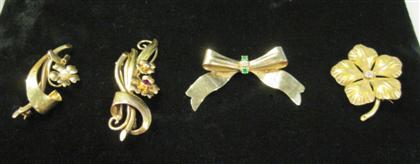 Appraisal: Group of yellow gold and gem set pinsOne karat 'flower