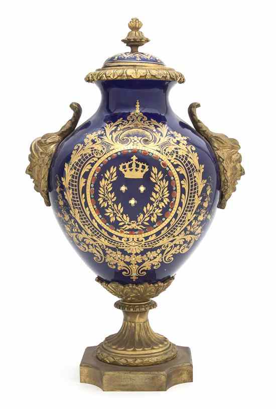 Appraisal: A Sevres Style Porcelain and Gilt Metal Mounted Urn of