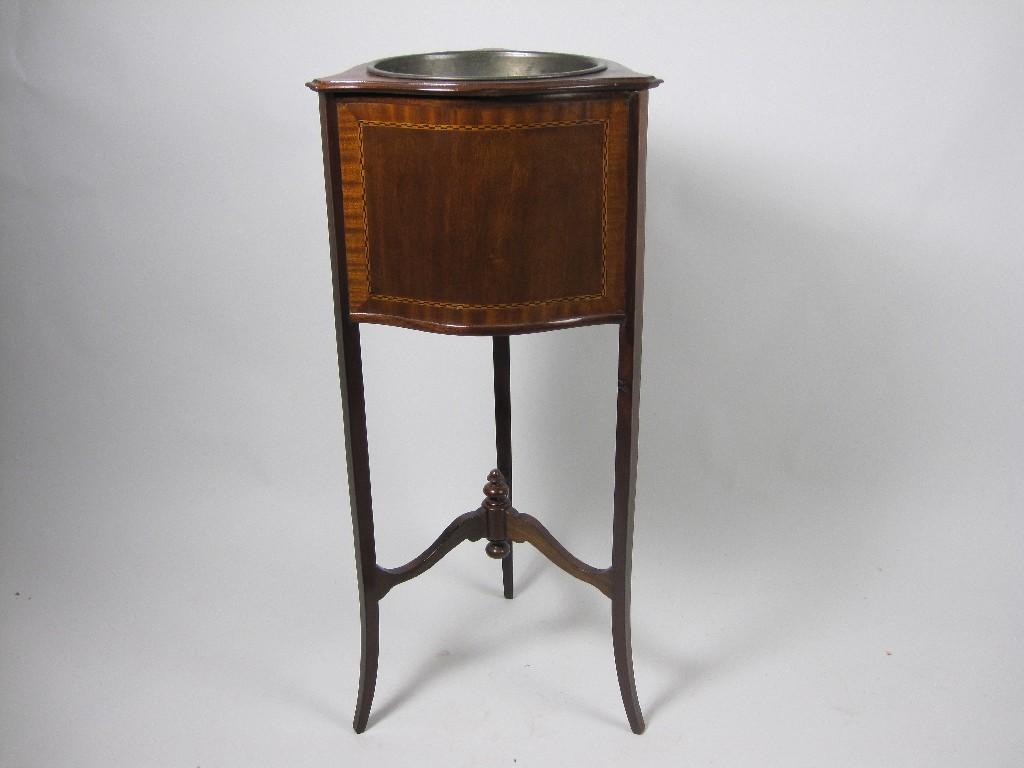 Appraisal: An Edwardian inlaid mahogany Planter with metal liner