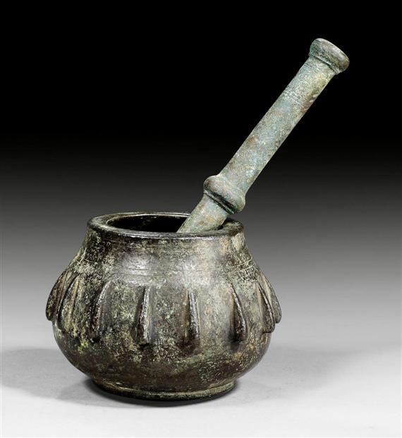 Appraisal: MORTAR WITH PESTLE Baroque Spain th century Bronze partly corroded