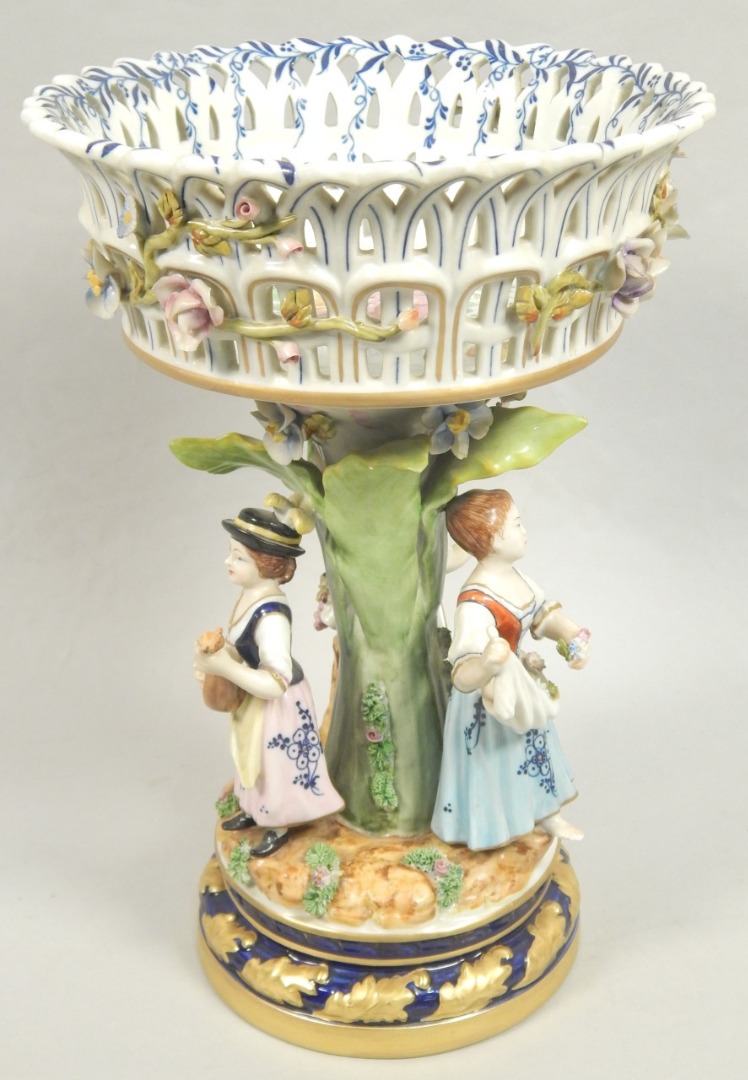 Appraisal: A continental porcelain centrepiece with a pierced flower encrusted bowl