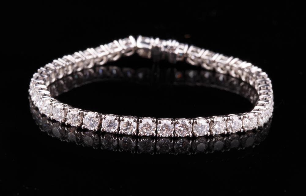 Appraisal: Platinum and Diamond Flexible Link Bracelet comprised of prong-set round