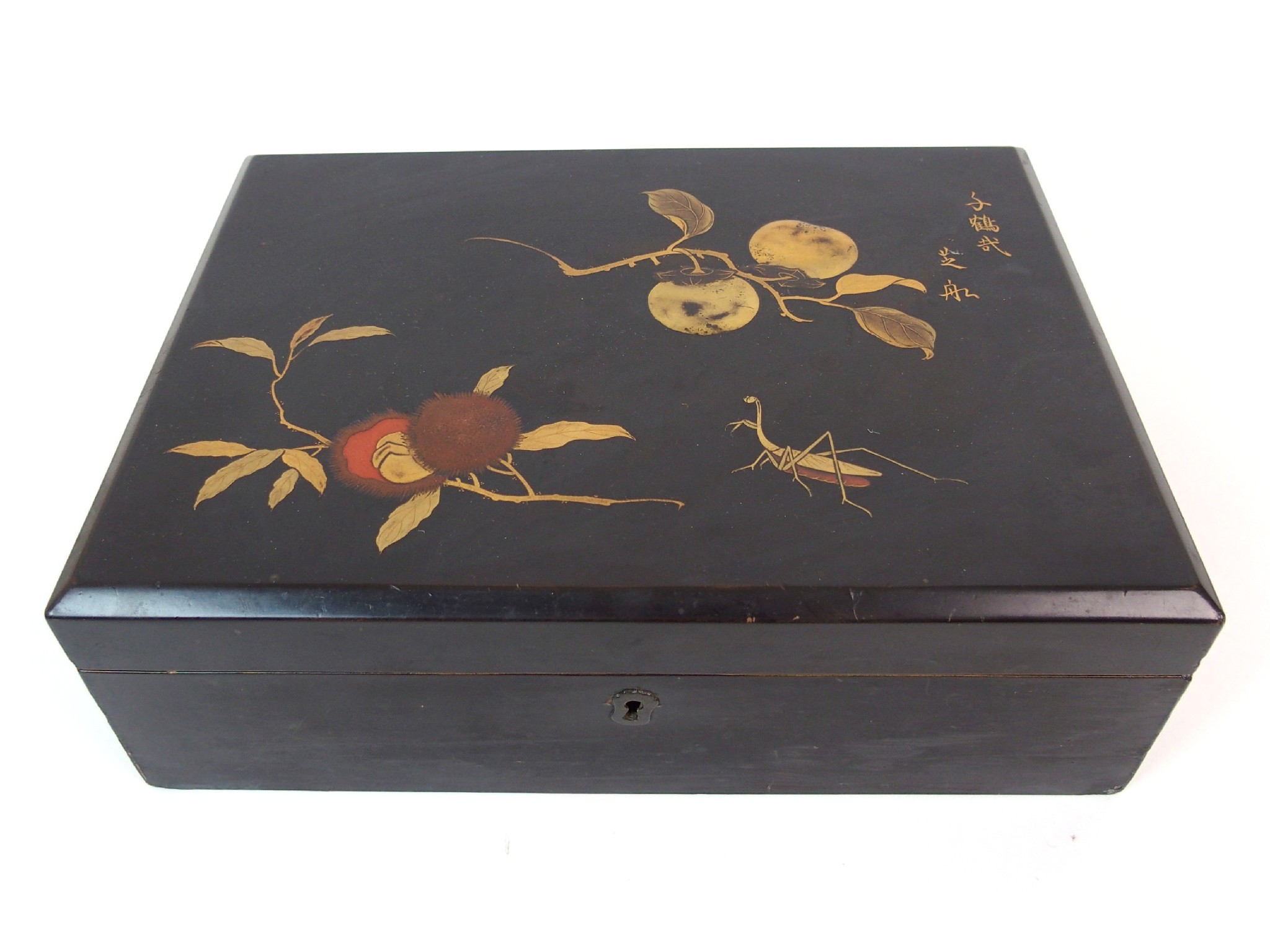 Appraisal: A Japanese black lacquered rectangular boxthe hinged cover decorated with