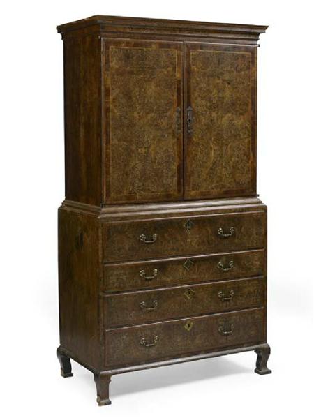 Appraisal: A burr walnut and crossbanded secretaire cabinet In the early