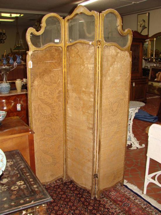 Appraisal: French carved giltwood tri-fold dressing screen circa foliage-and-scroll carved top