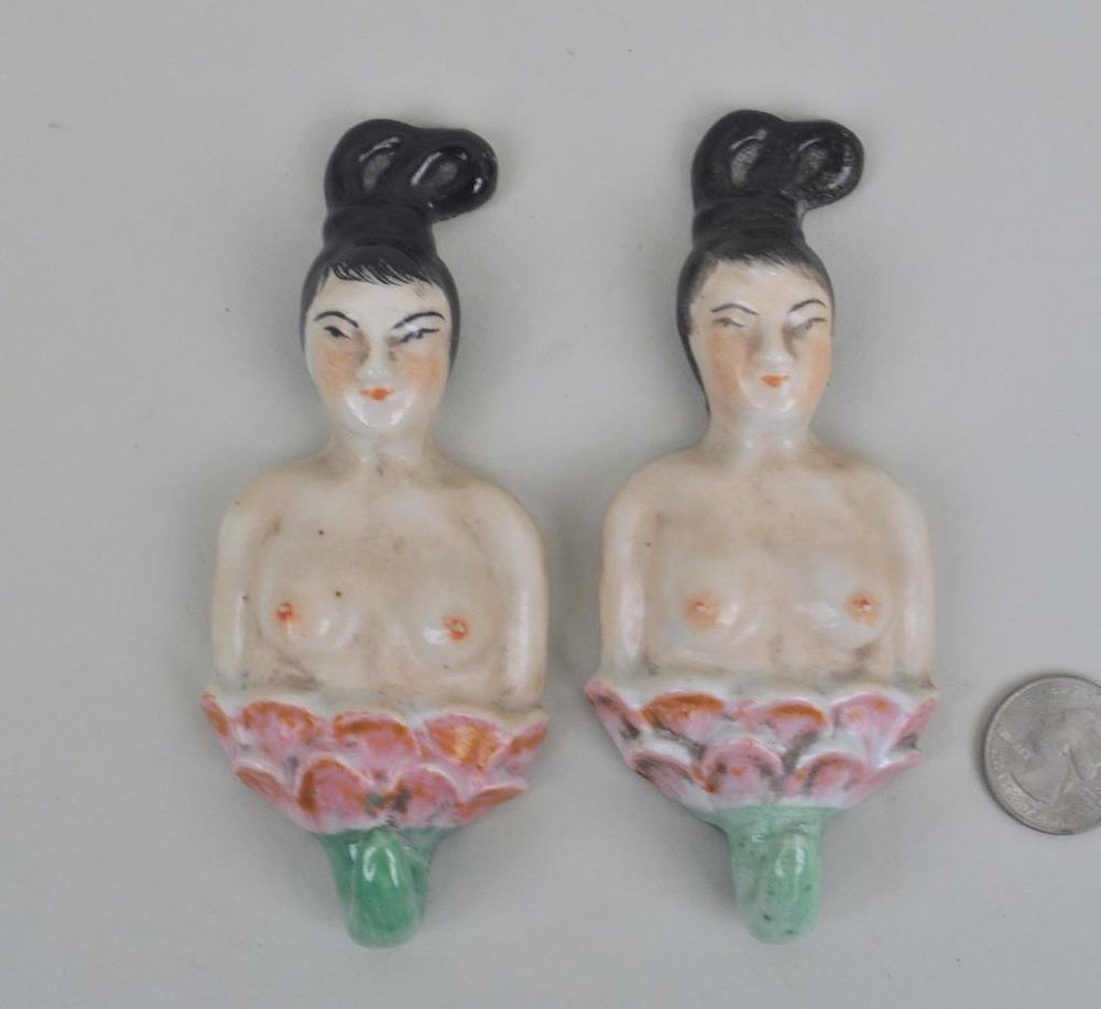 Appraisal: Pair Chinese Porcelain Figural Hooks in the form of semi-nude