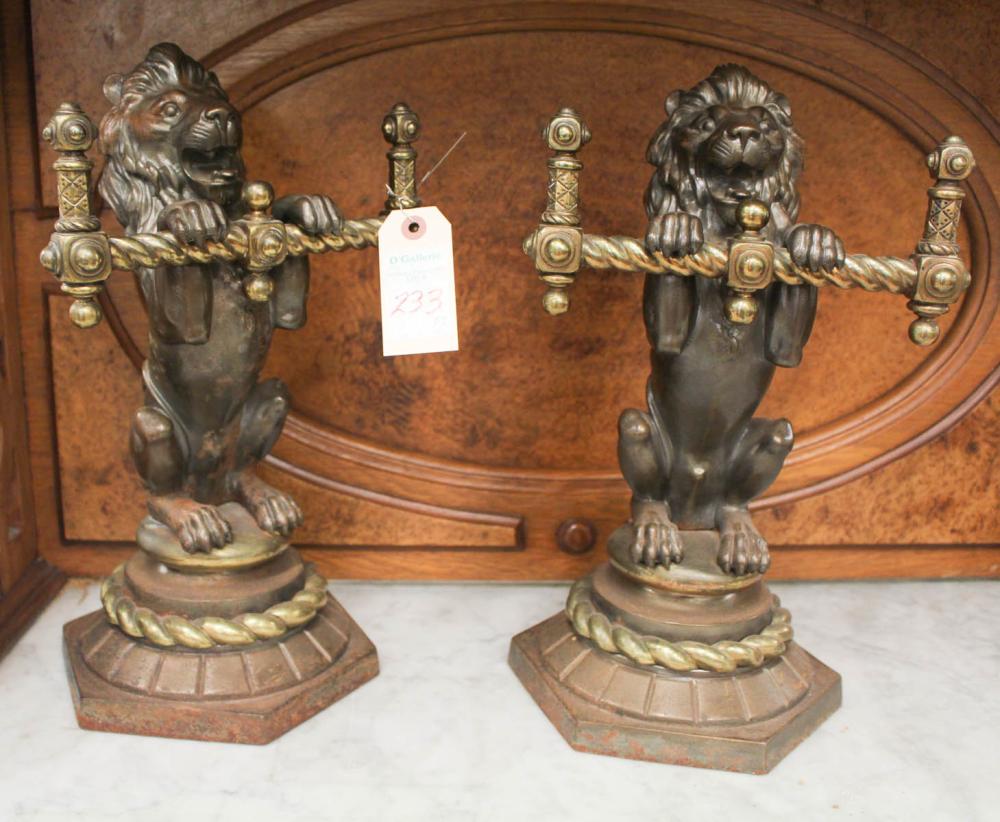 Appraisal: PAIR OF FIGURAL FIREPLACE CHENETS cast iron rampant lions with