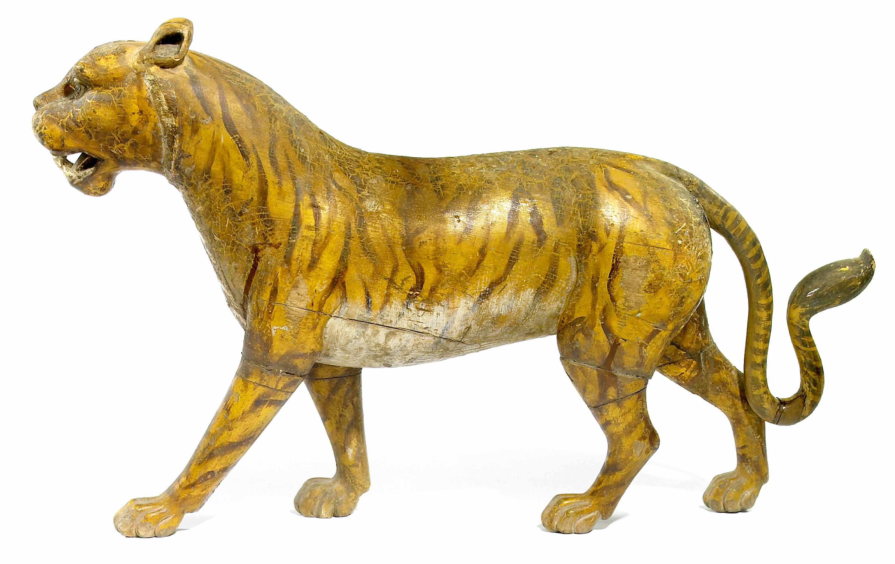 Appraisal: A Continental polychrome decorated carved model of a standing tiger