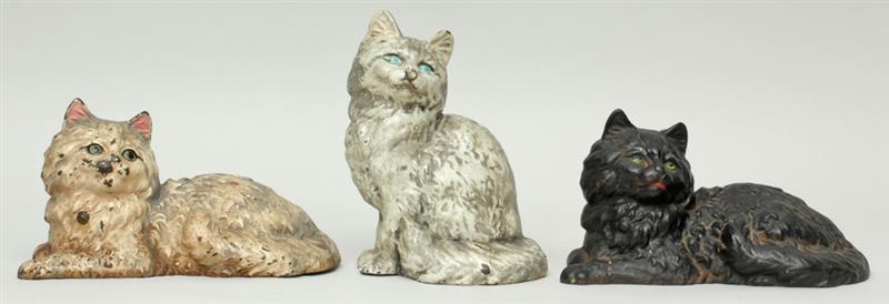 Appraisal: Group of Three Cast-Iron Cat-Form Doorstops Comprising two recumbent cats