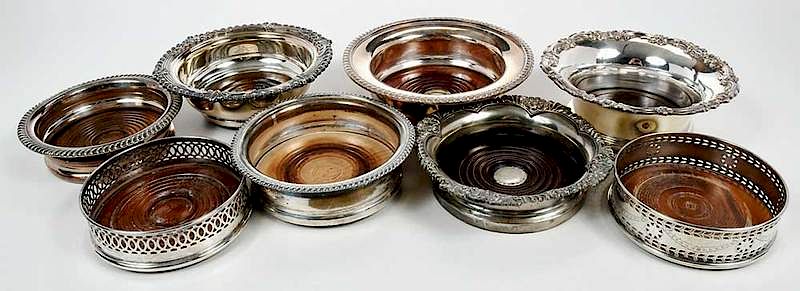 Appraisal: Eight Silver-Plated wine coaster most English th th century one