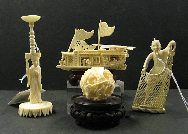 Appraisal: Three ivory ornaments The first a small reticulated treasure boat