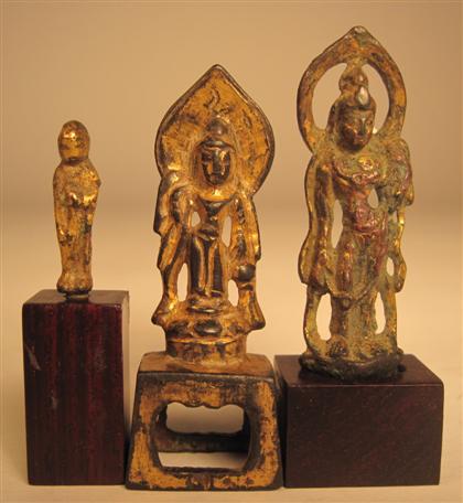 Appraisal: Three Chinese gilt bronze deitiespossibly tang dynasty and later