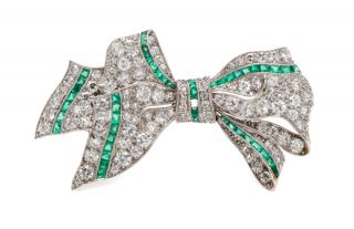 Appraisal: An Edwardian Platinum Diamond and Emerald Bow Brooch J E